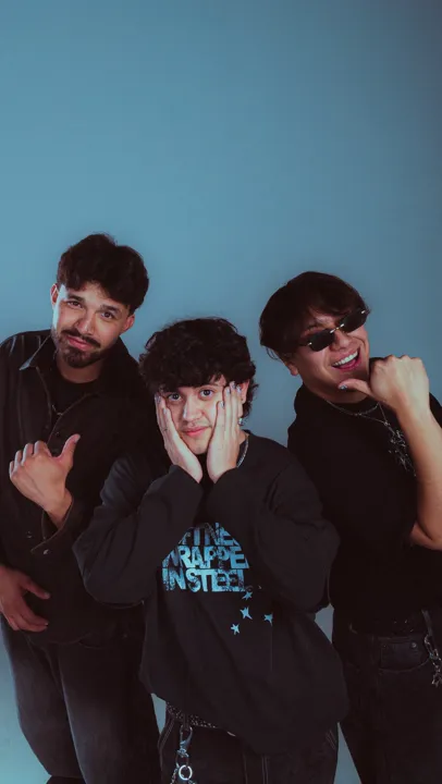 The three members of Billy Manhattan in a studio promo photo
